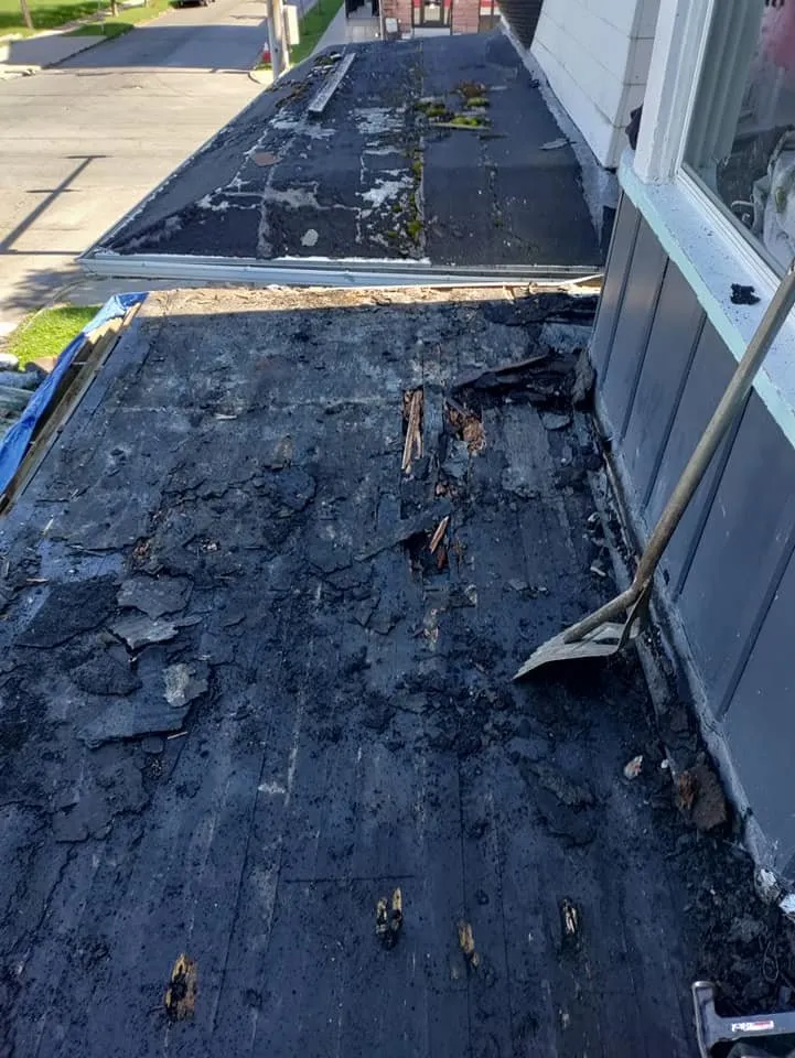 Slide of Garnos Roofing