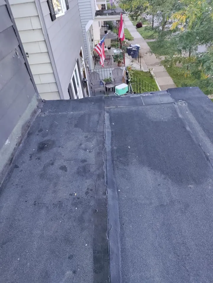 Slide of Garnos Roofing