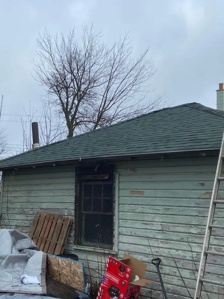 Slide of Garnos Roofing