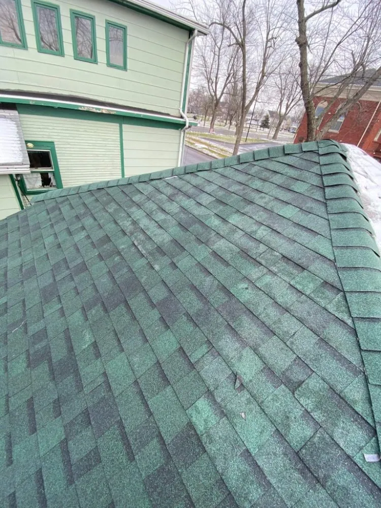 Slide of Garnos Roofing