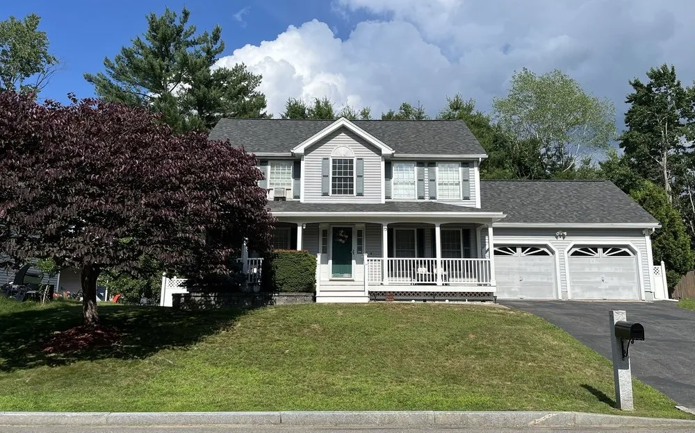Slide of Garon-teed Roofing