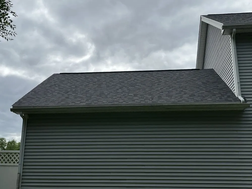 Slide of Garon-teed Roofing