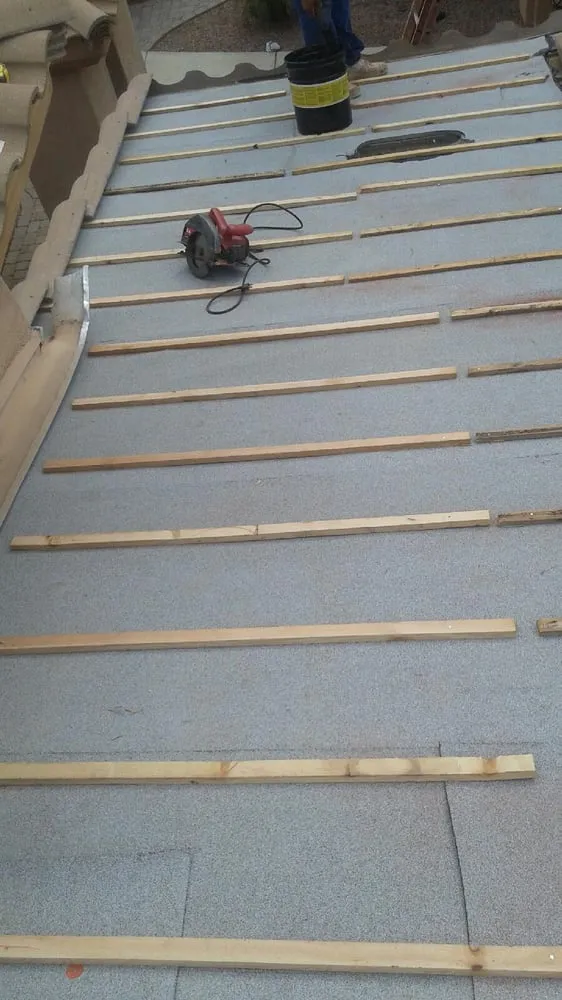 Slide of Gary and Son Roofing