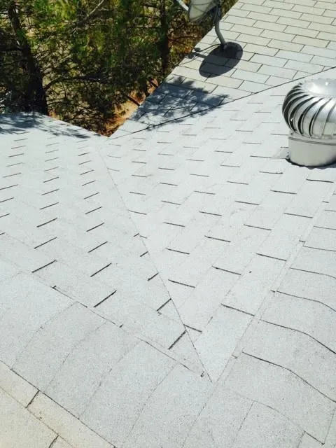 Slide of Gary and Son Roofing