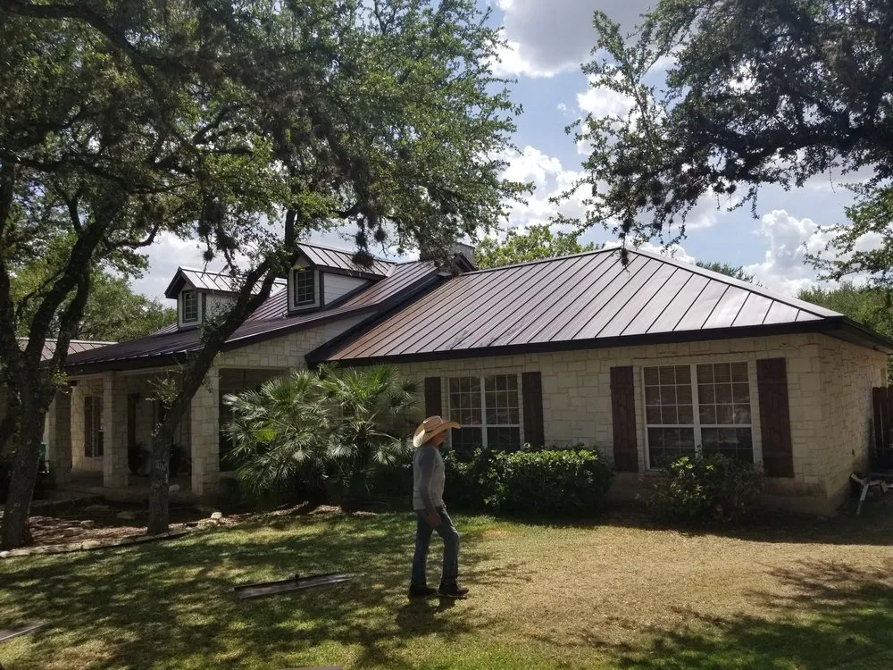 Local flat roof repair with free inspection in Pipe Creek, TX by Garza Roofing