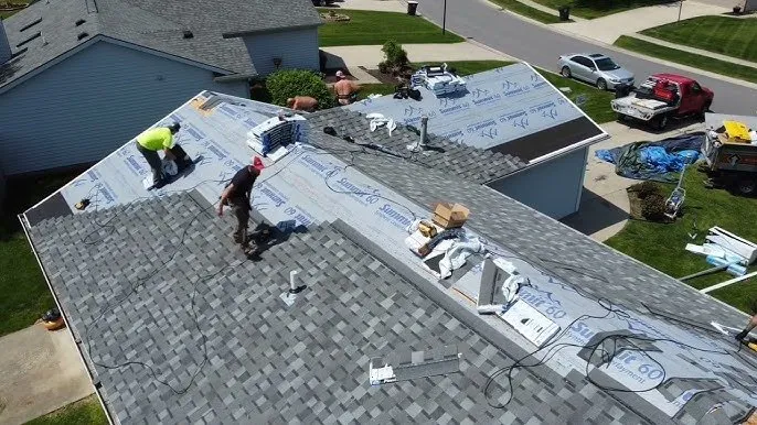 Emergency flat roof repair after storm damage in St Clair Shores, MI by Gasparotto Roofing