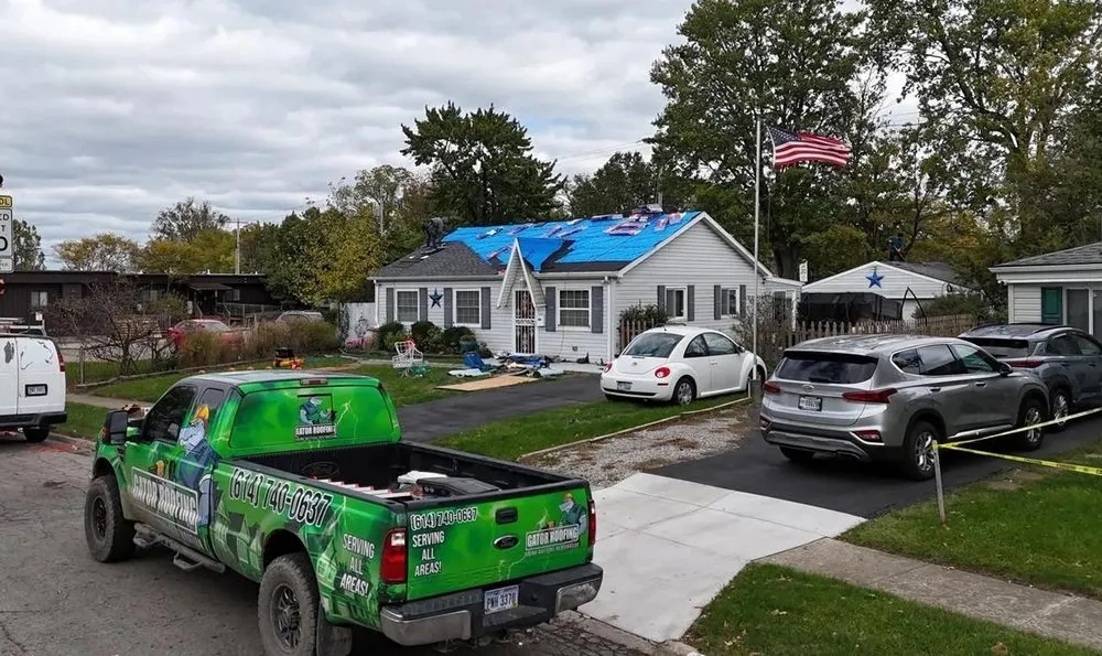 Slide of Gator Roofing