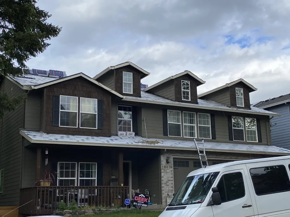 Slide of Geek Roofing