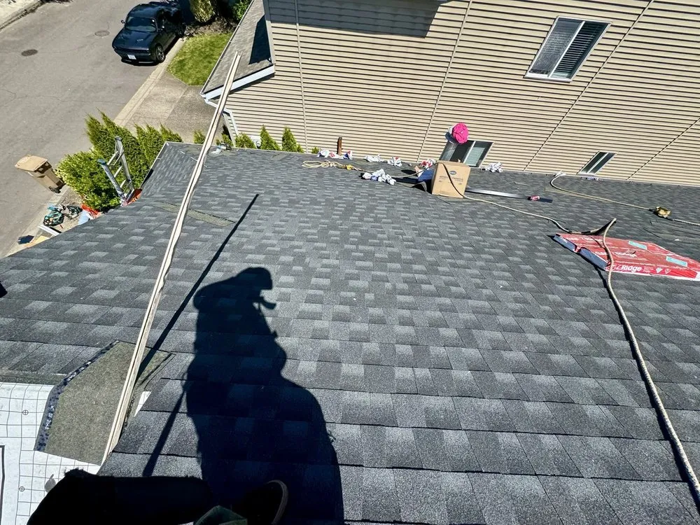 Slide of Geek Roofing