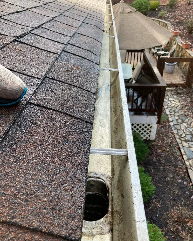 Slide of General gutter cleaning & roof maintenance