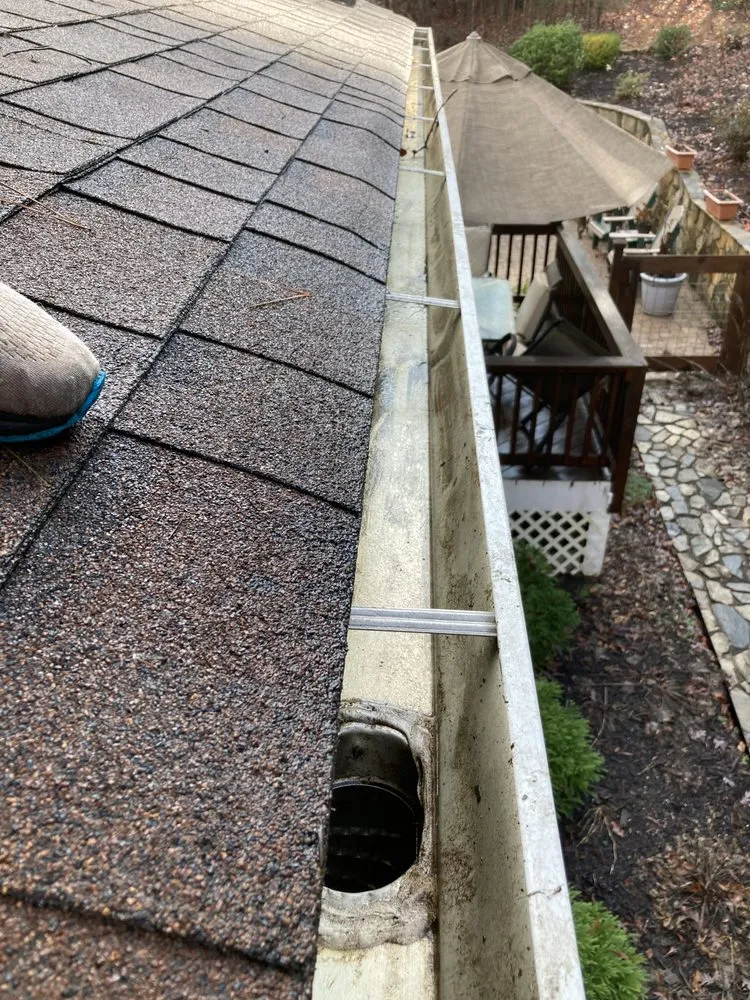 Slide of General gutter cleaning & roof maintenance