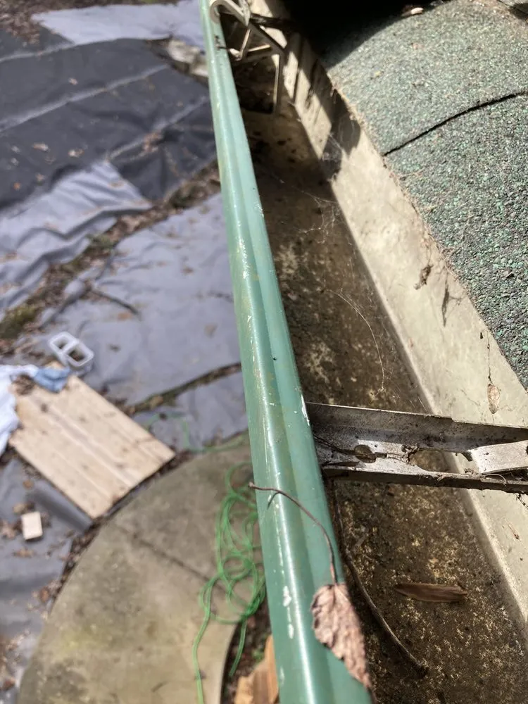 Slide of General gutter cleaning & roof maintenance