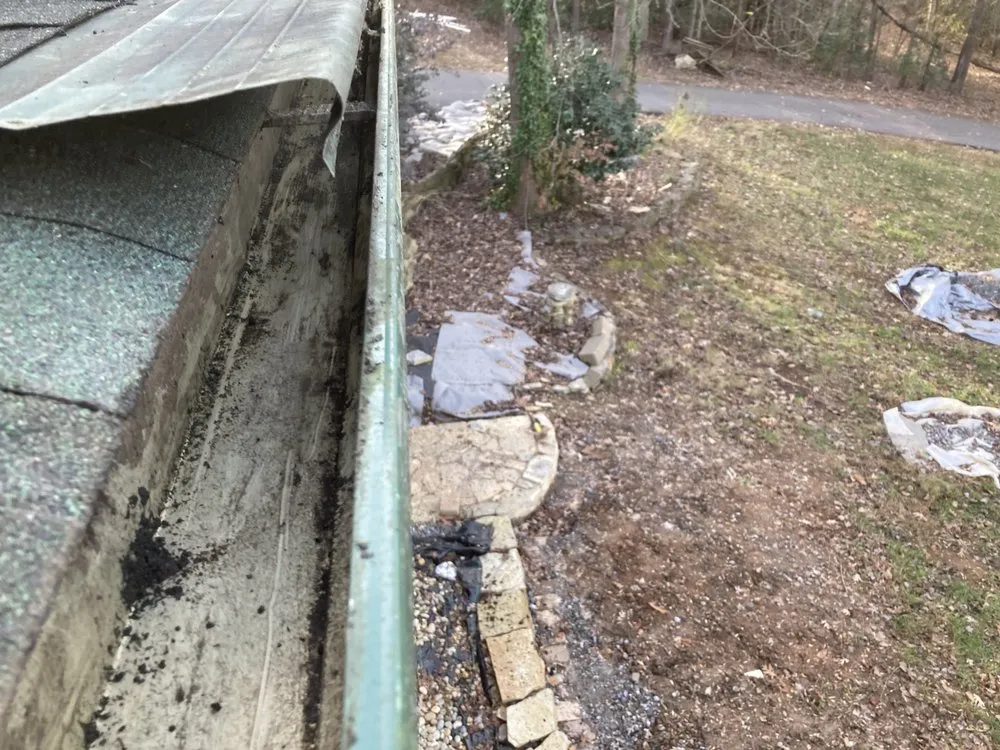 Slide of General gutter cleaning & roof maintenance