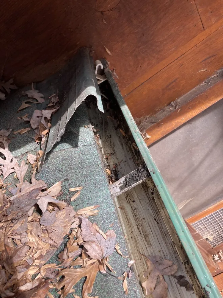 Slide of General gutter cleaning & roof maintenance