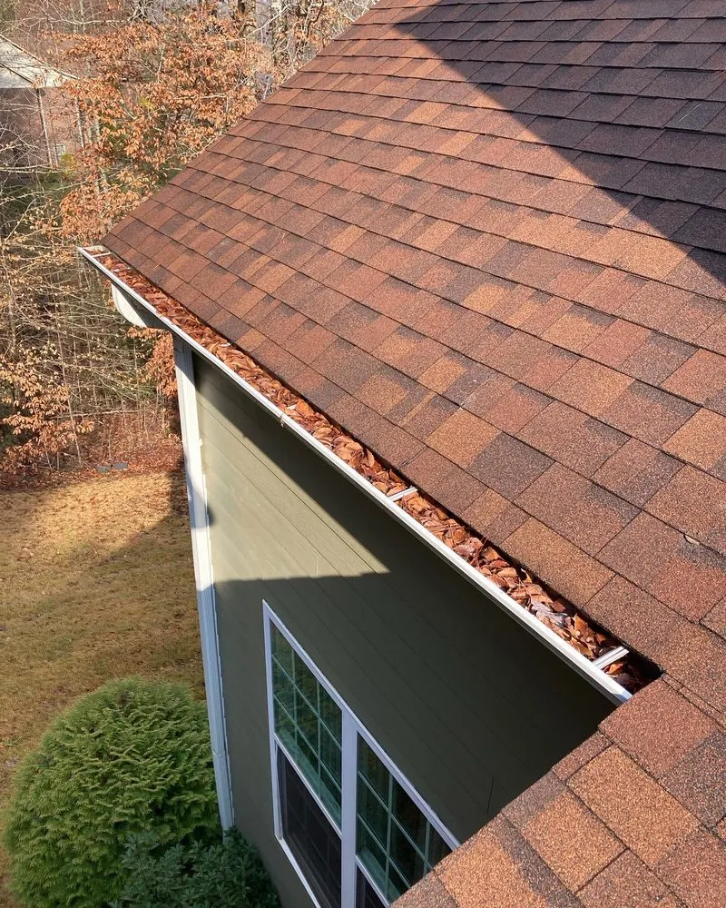 Slide of General gutter cleaning & roof maintenance