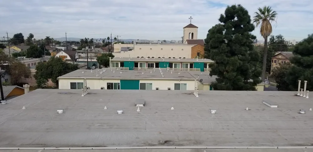 Slide of Genesis Pro Roofing