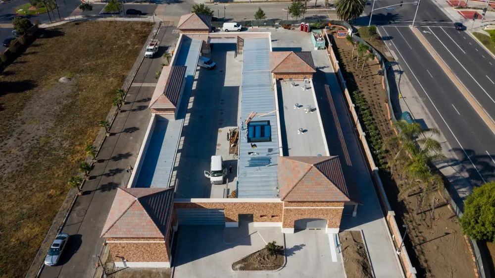 Slide of Genesis Pro Roofing