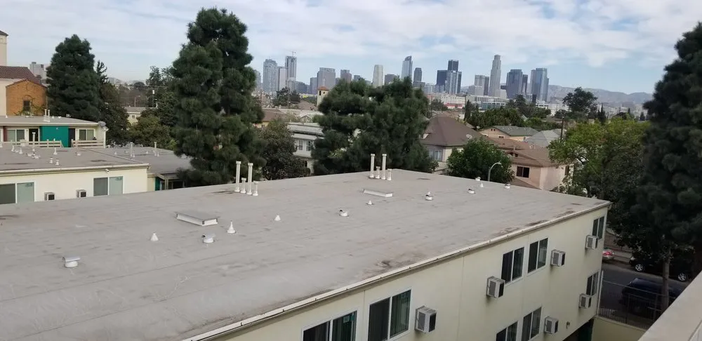 Slide of Genesis Pro Roofing