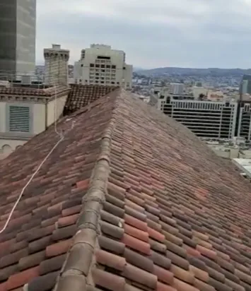 Slide of Genesis Pro Roofing