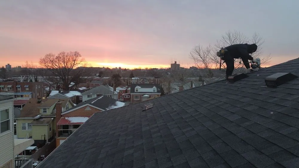 Slide of Genesis Roofing