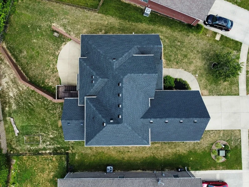 Slide of Genesis Roofing