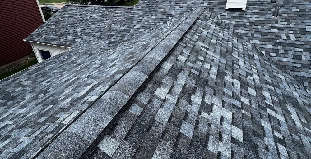 Slide of Genesis Roofing