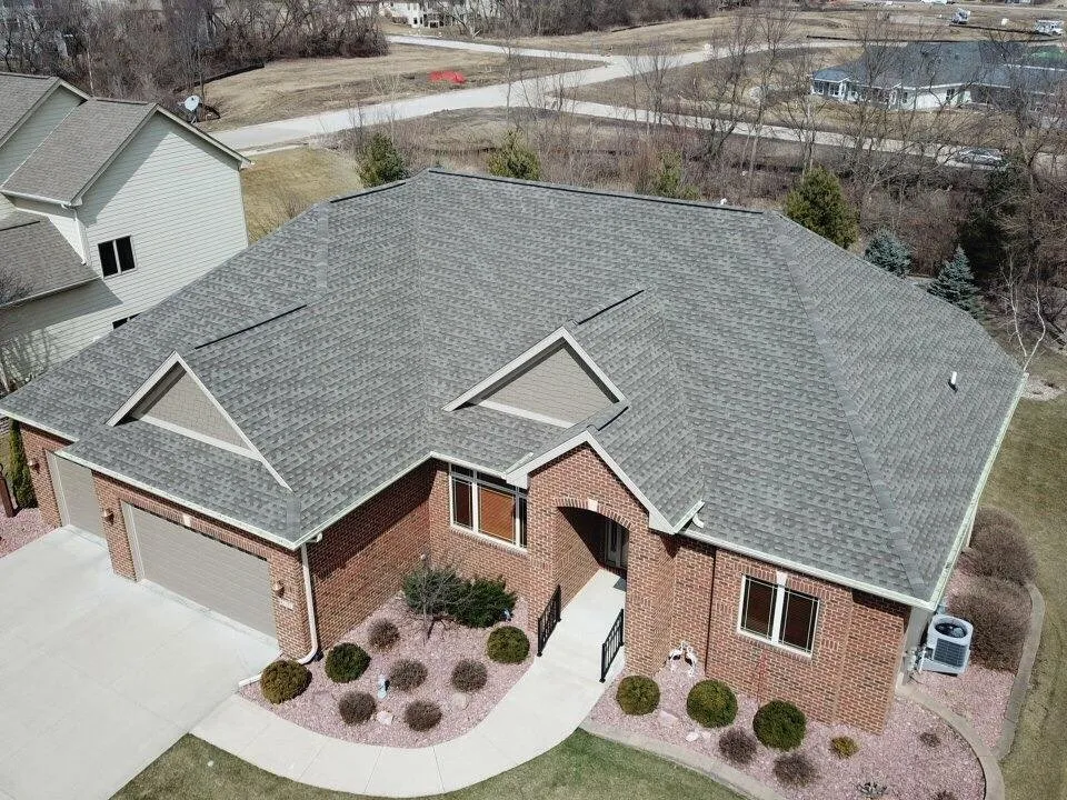 Professional roof inspection in Cumming, IA - Genesis Roofing