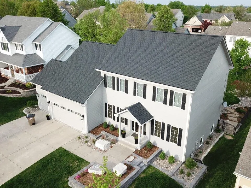 Emergency residential roofing service in Cumming, IA by Genesis Roofing