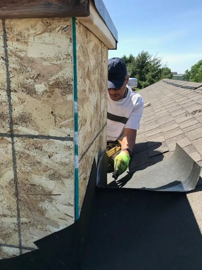 Licensed metal roofing installation for fast service in Cumming, IA by Genesis Roofing