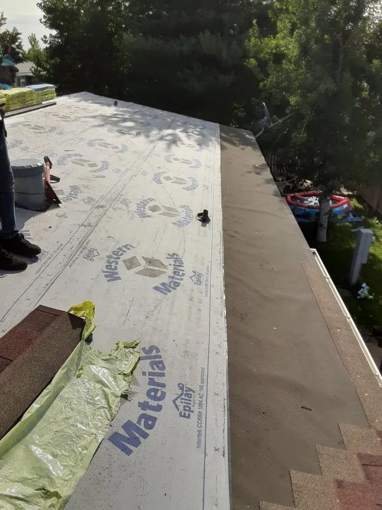 Slide of Genesis Roofing