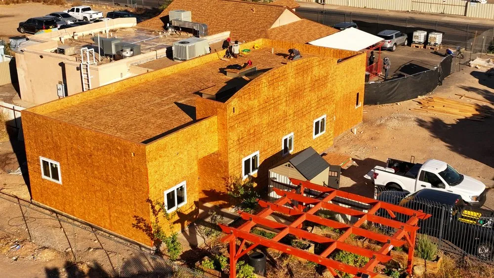 Slide of Genesis Roofing