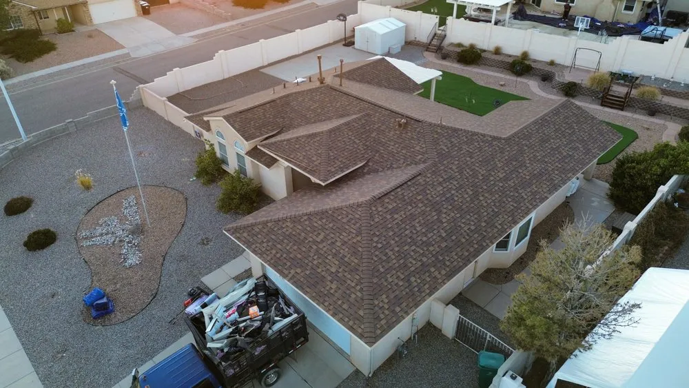 Slide of Genesis Roofing