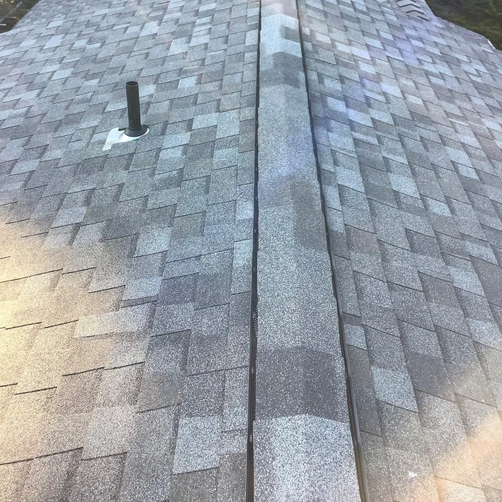 Slide of Genesis Roofing Services