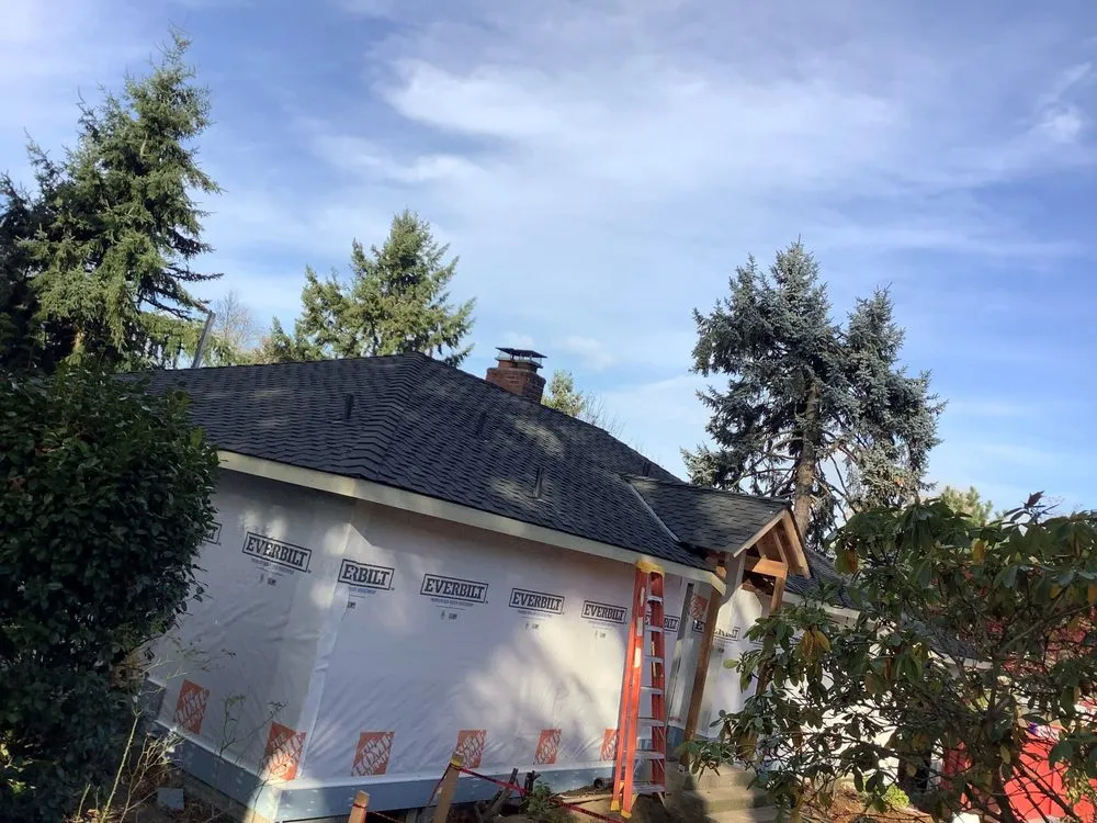 Slide of Genesis Roofing Services