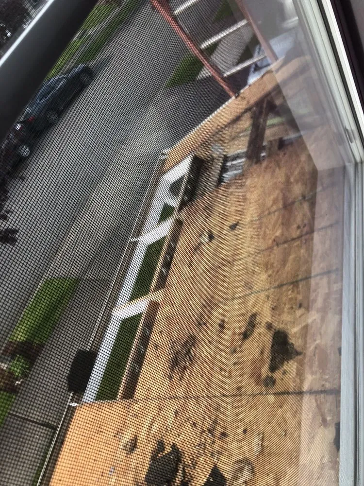 Slide of Genesis Roofing Services