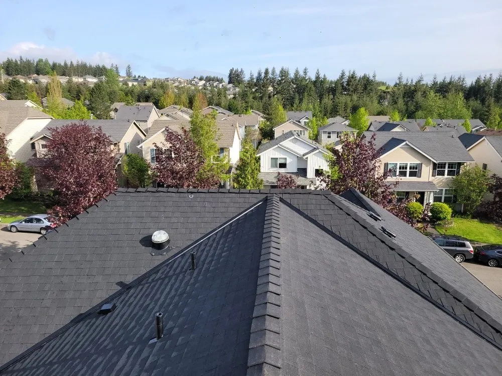 Slide of Genesis Roofing Services