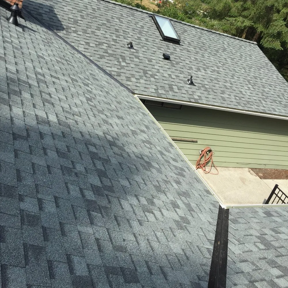 Slide of Genesis Roofing Services