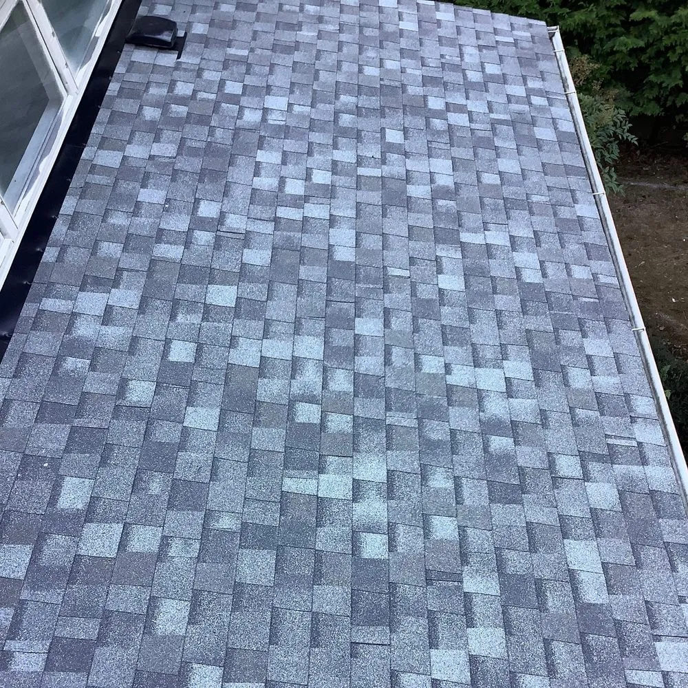 Slide of Genesis Roofing Services