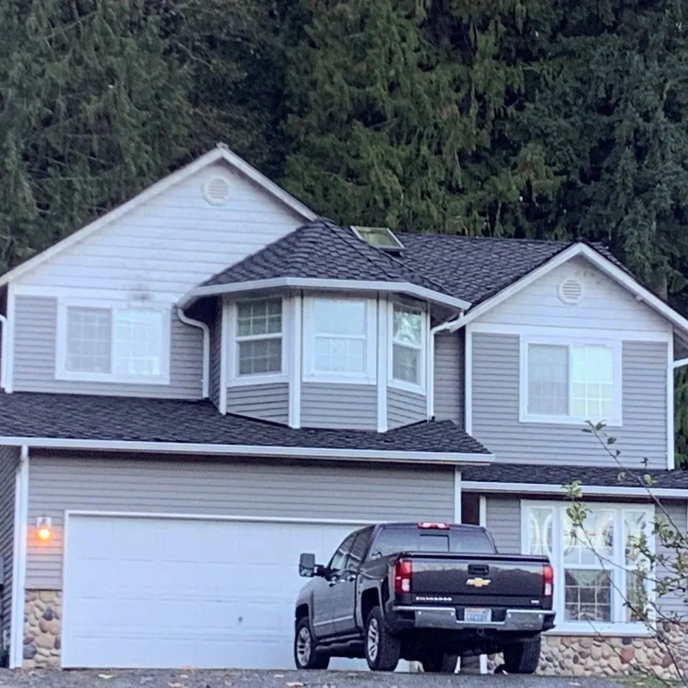 Slide of Genesis Roofing Services