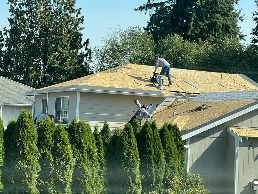 Slide of Genesis Roofing Services