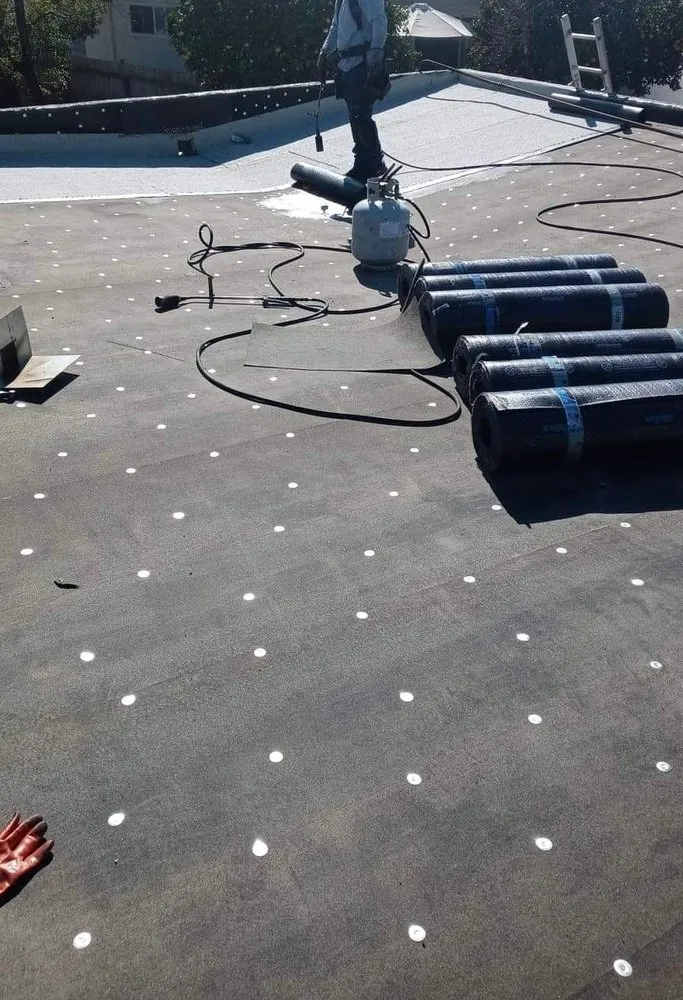 Slide of Genuine Roofer