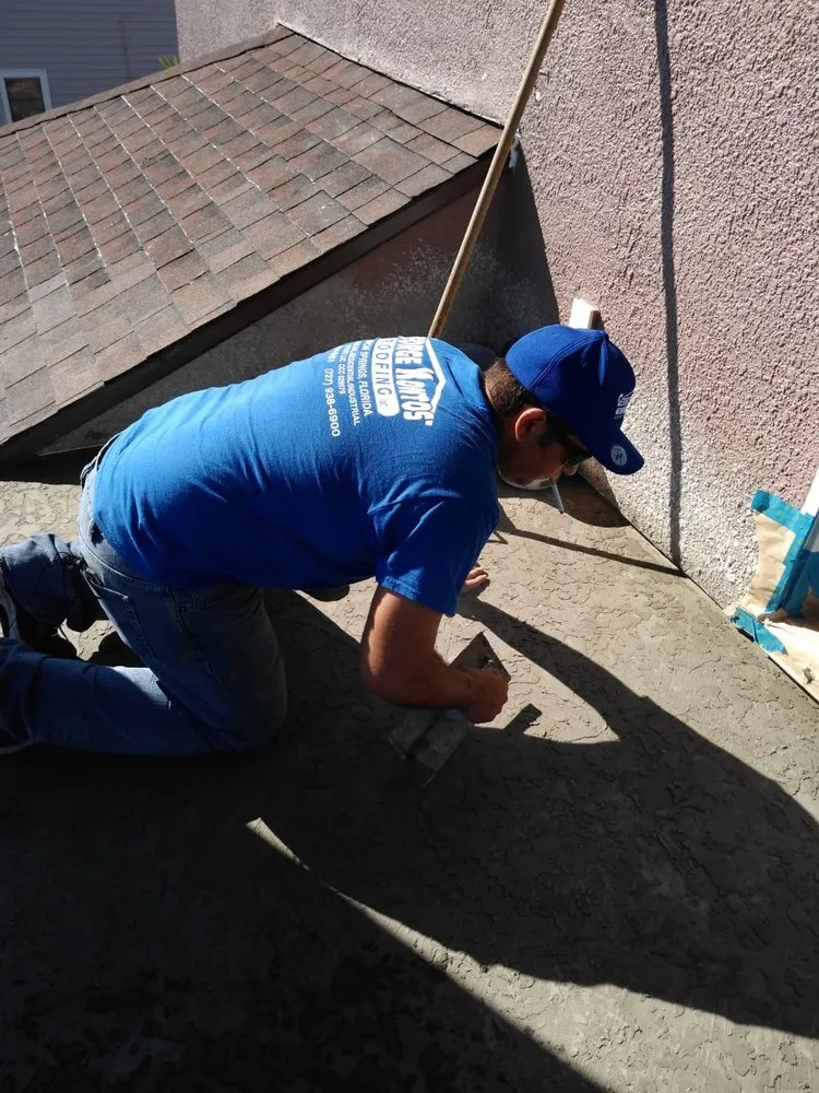 Slide of George Kontos Roofing