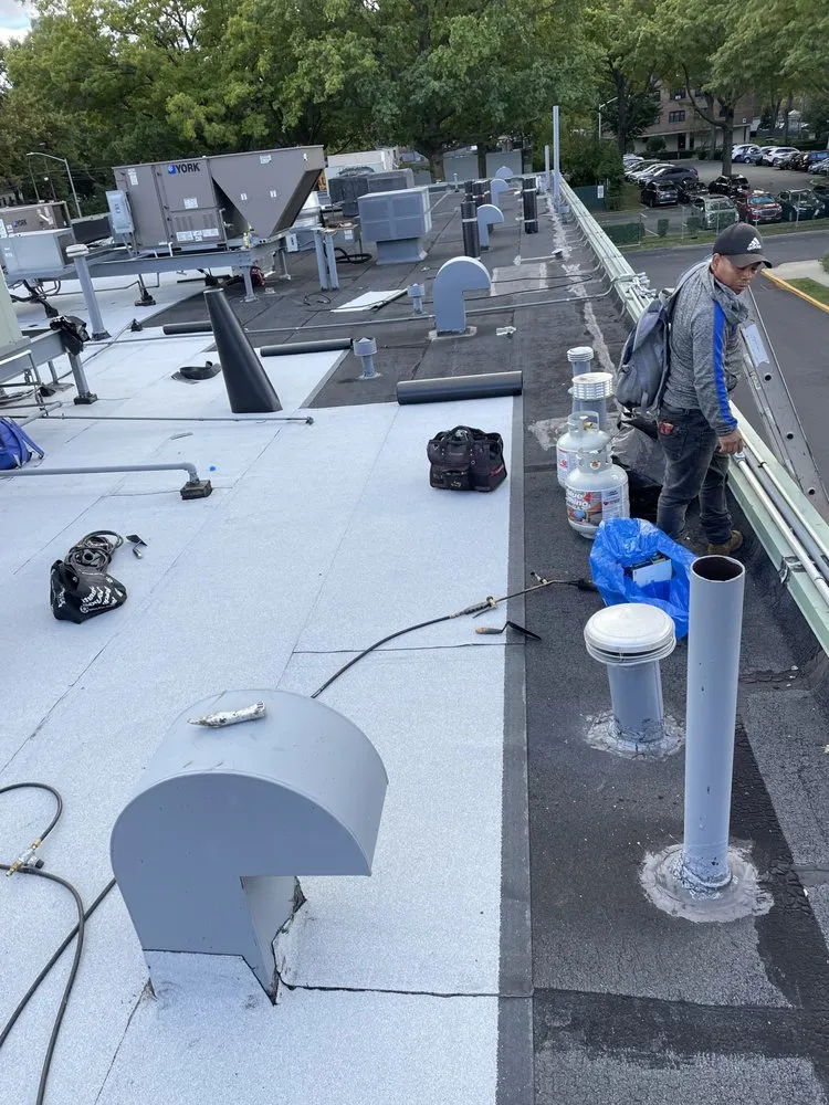 Slide of George's Roofing