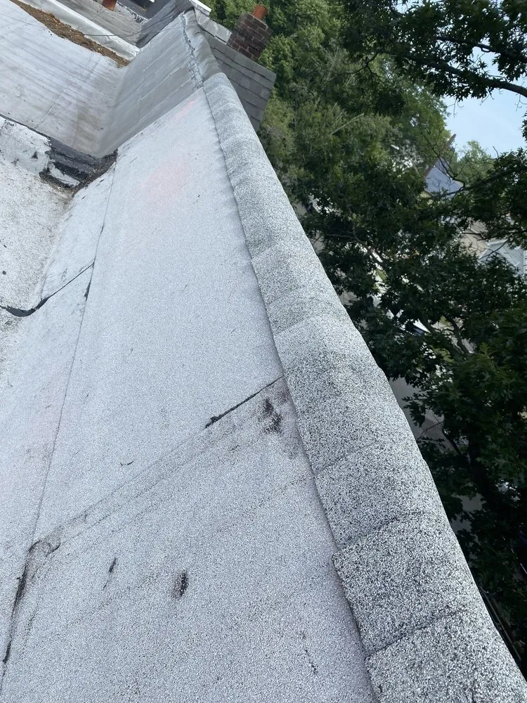 Slide of George's Roofing