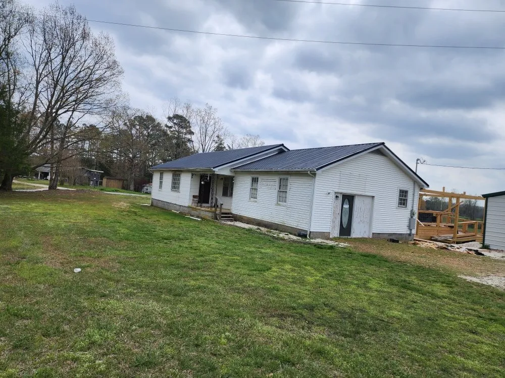 Top-rated flat roof repair in Holladay, TN by George's Roofing