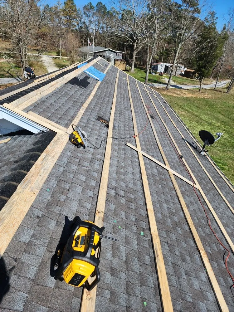 Licensed storm damage roof repair experts serving Holladay, TN - George's Roofing