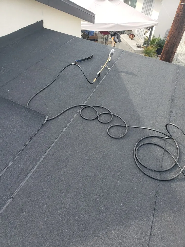 Slide of Gerardo roofing