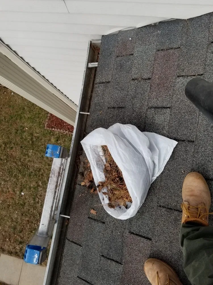 Slide of German Fuentes Gutter Cleaning