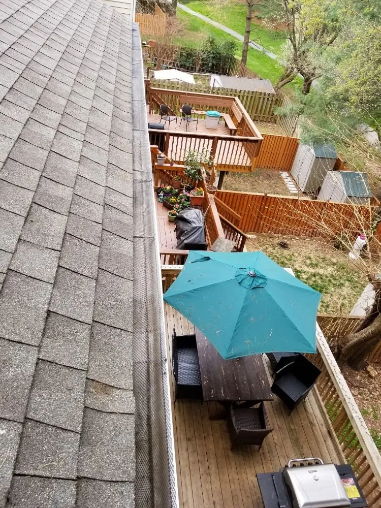 Slide of German Fuentes Gutter Cleaning