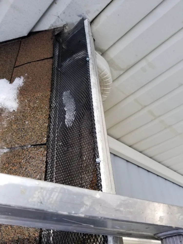 Slide of German Fuentes Gutter Cleaning